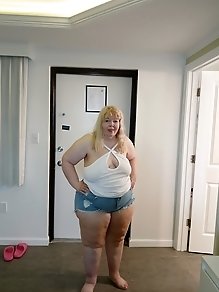 A blonde is indulging in solo pleasure while her husband is at work